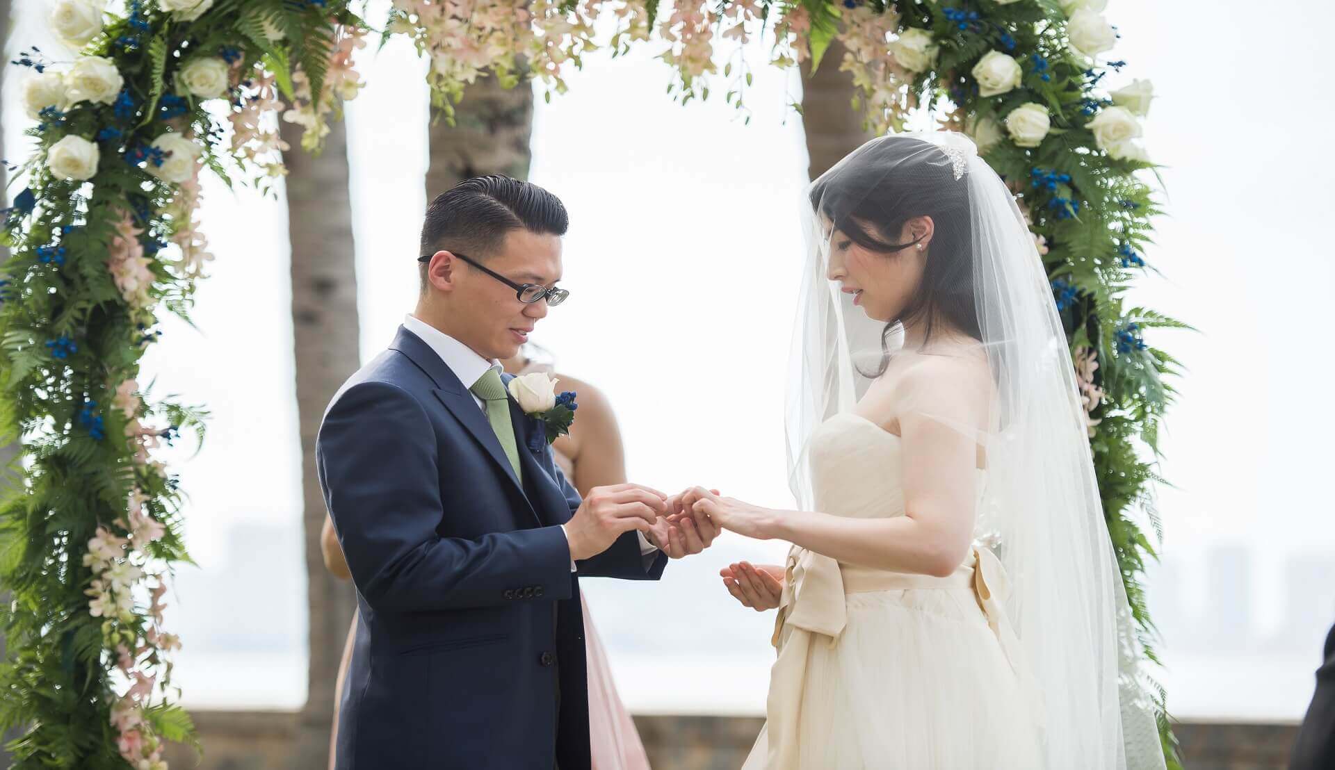 Sugar & Spice Events - Couple exchange wedding ring in the ceremony