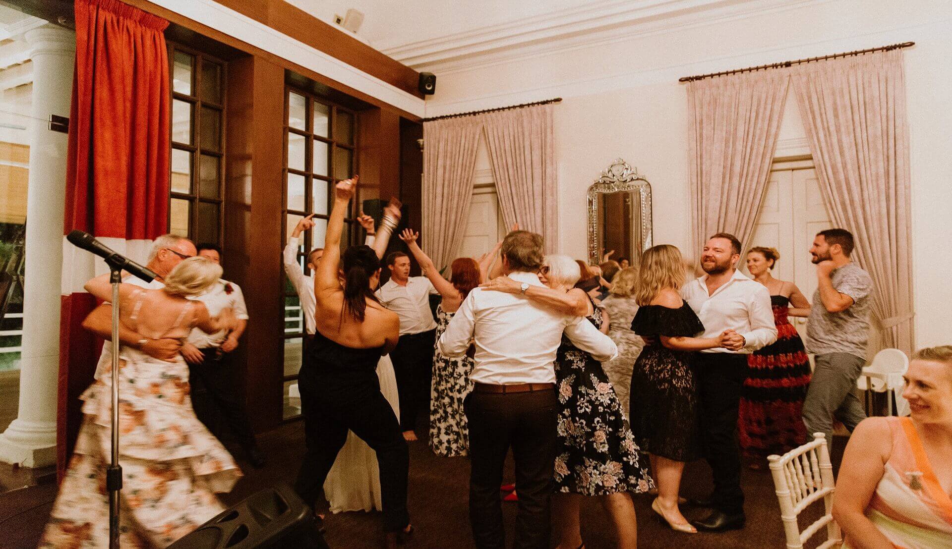 Sugar & Spice Events - Guests enjoying themselves at the dancing floor after the wedding ceremony